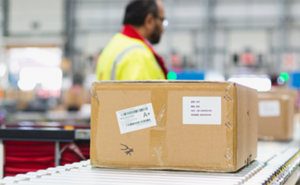 Boxes on a conveyor belt 1440x551