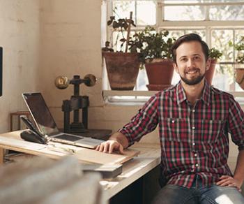 A small business owner in his office